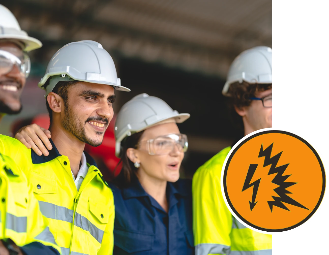 Several people smile and lean on each other as they participate in an arc flash safety training course.