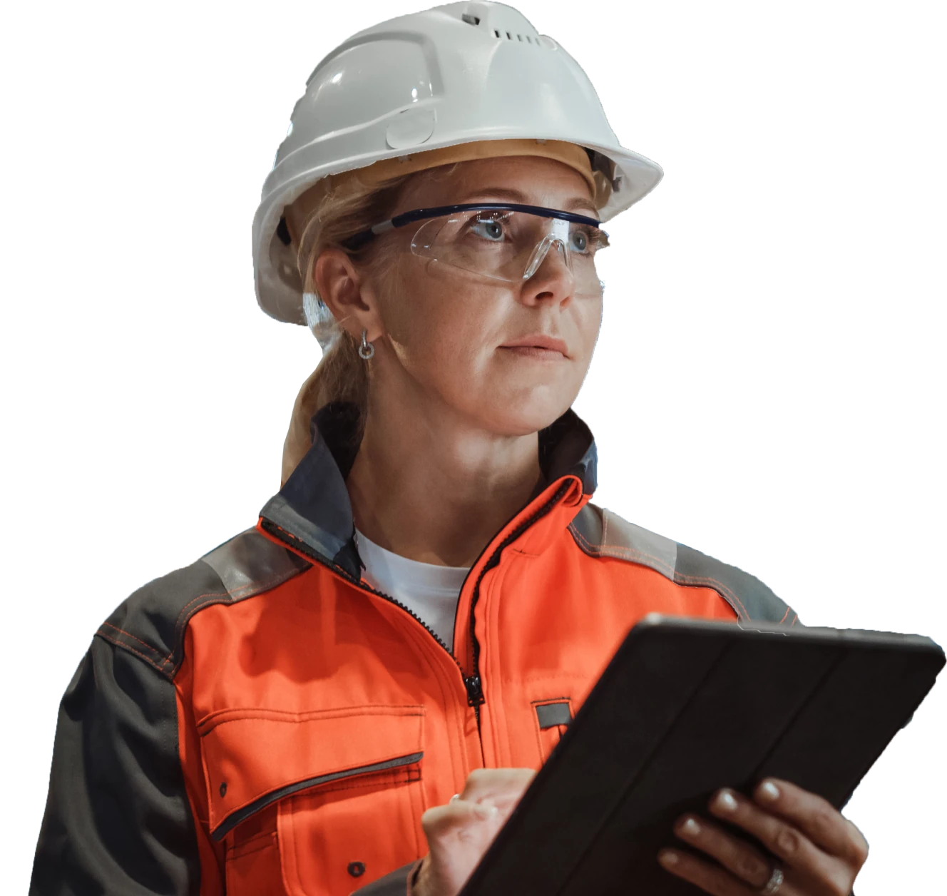 Electrical worker in a white hard hat and orange vest looks into the distance and taps on a tablet.