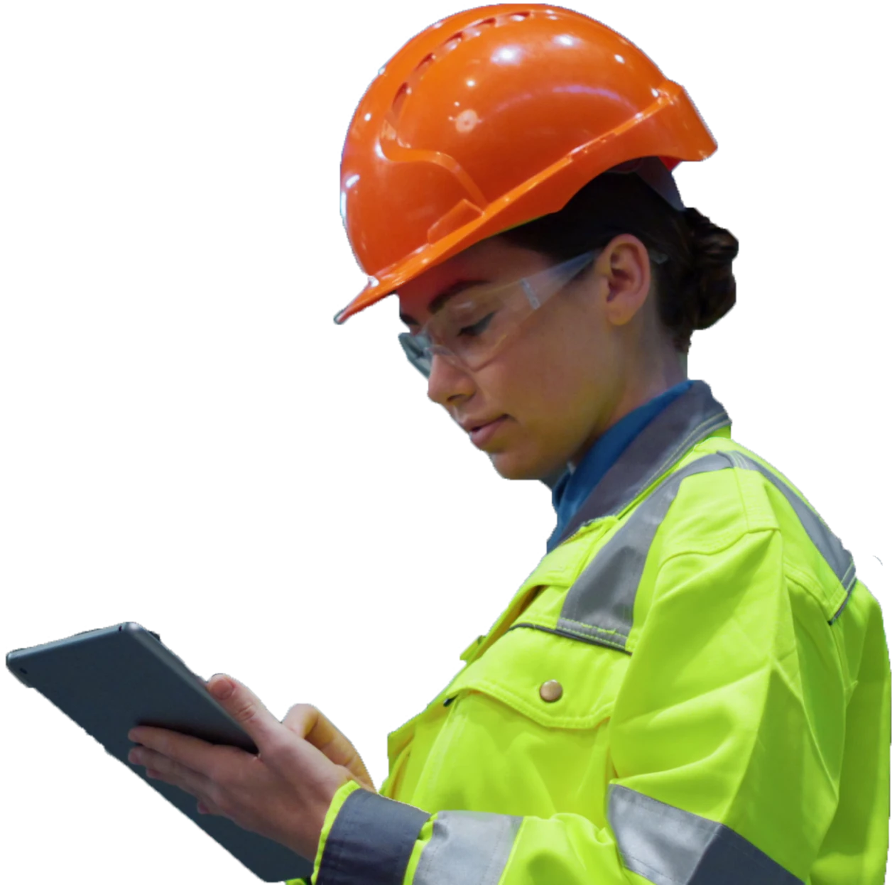 Woman in an orange hart hat and yellow vest looks at a tablet.